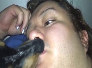 Fat zoophile is making out eagerly with that beast